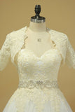 2024 Open Back A Line Wedding Dresses Tulle With Applique And Beads PXC2Z2BD